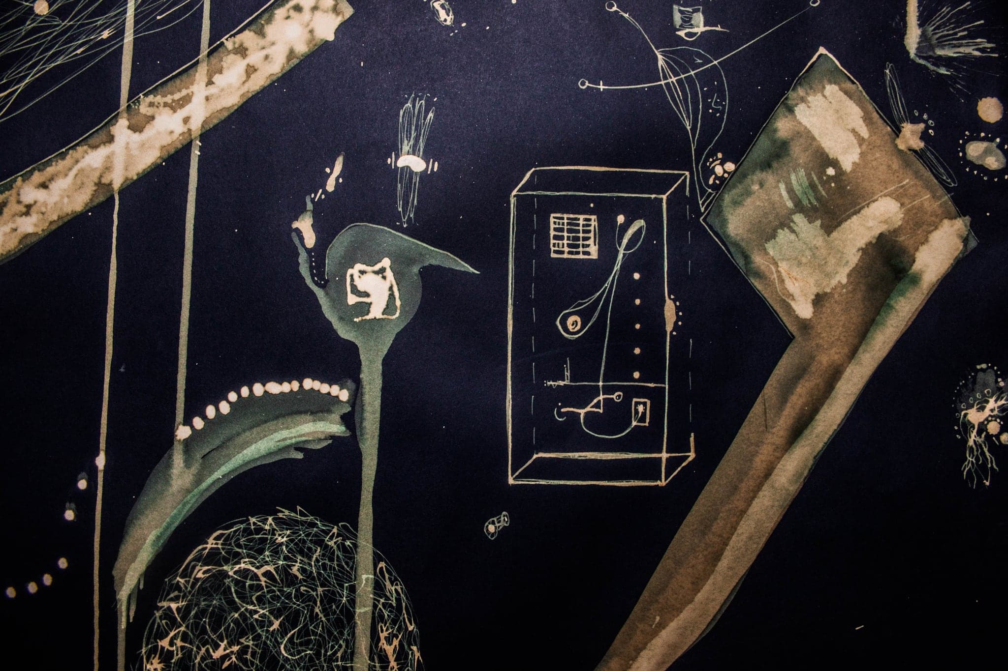 A wide dark sheet with a green pole, a bird-like form and a framed panel.