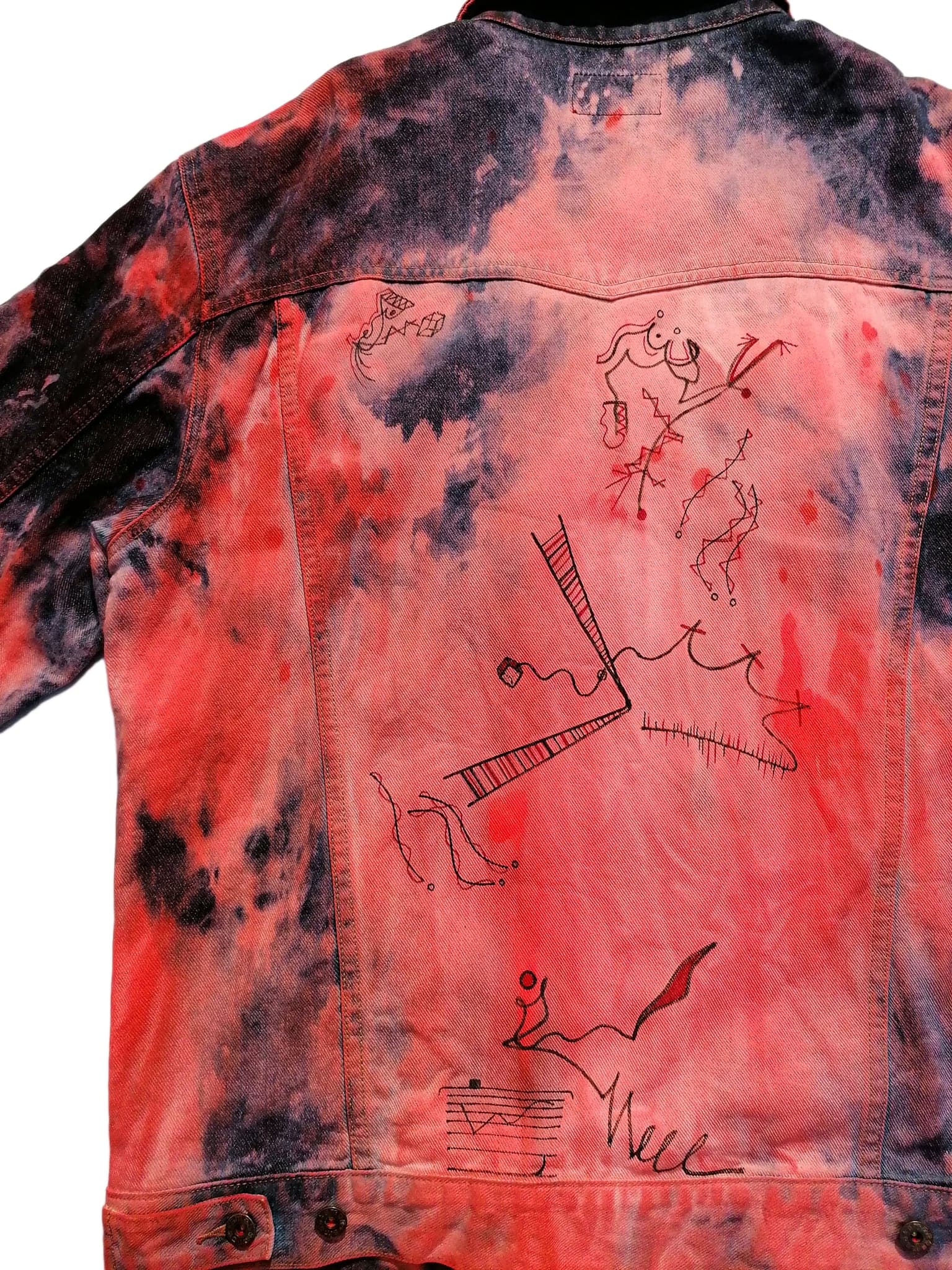 The back close up, a bird, a tower and a small standing figure drawn in thin black line over the red