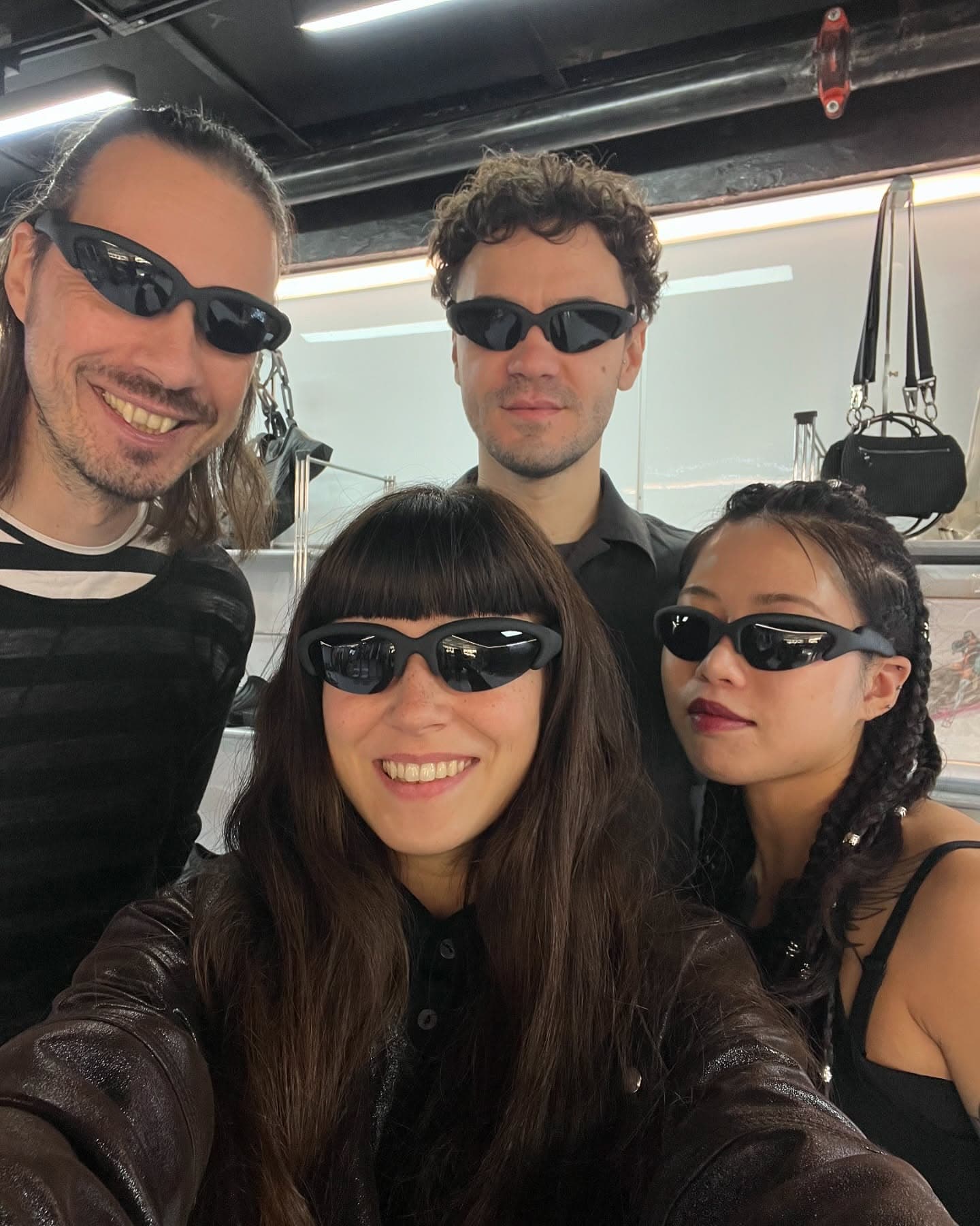 Three guests wearing the shades at the launch