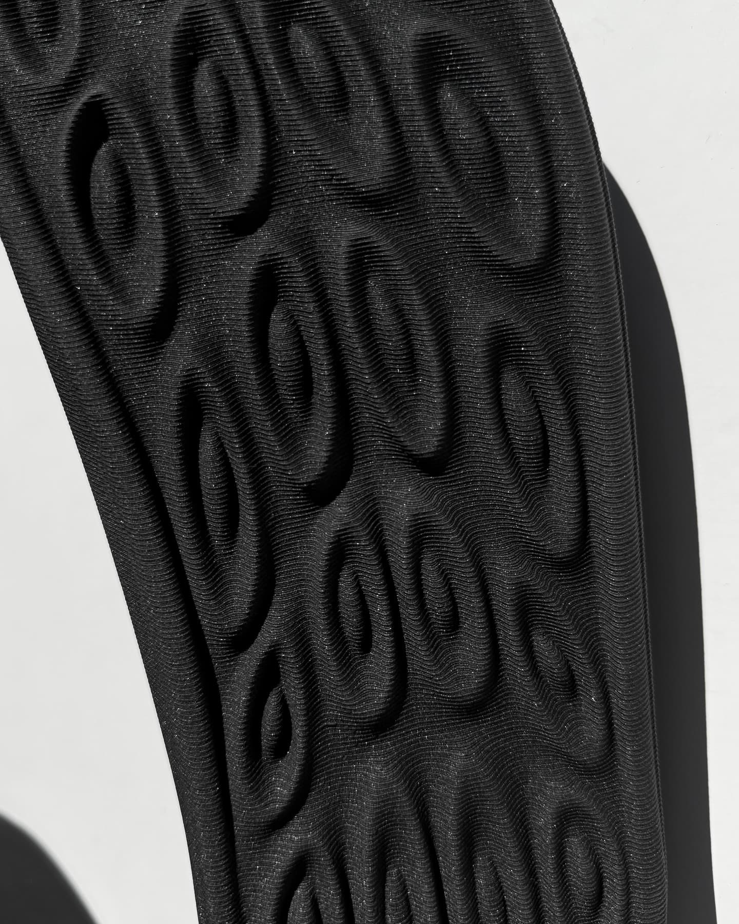 Macro of the NEVO sole tread showing 3D-print layer lines