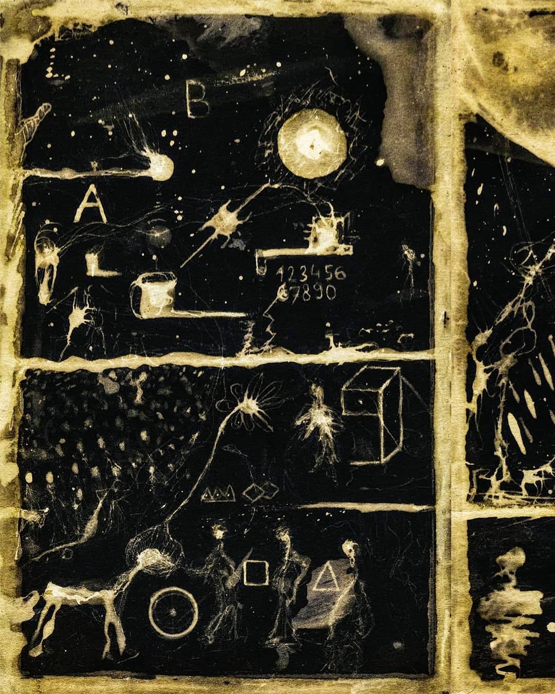 A spread carrying the letters A and B beside a moon, a grid of dots and a scatter of symbols