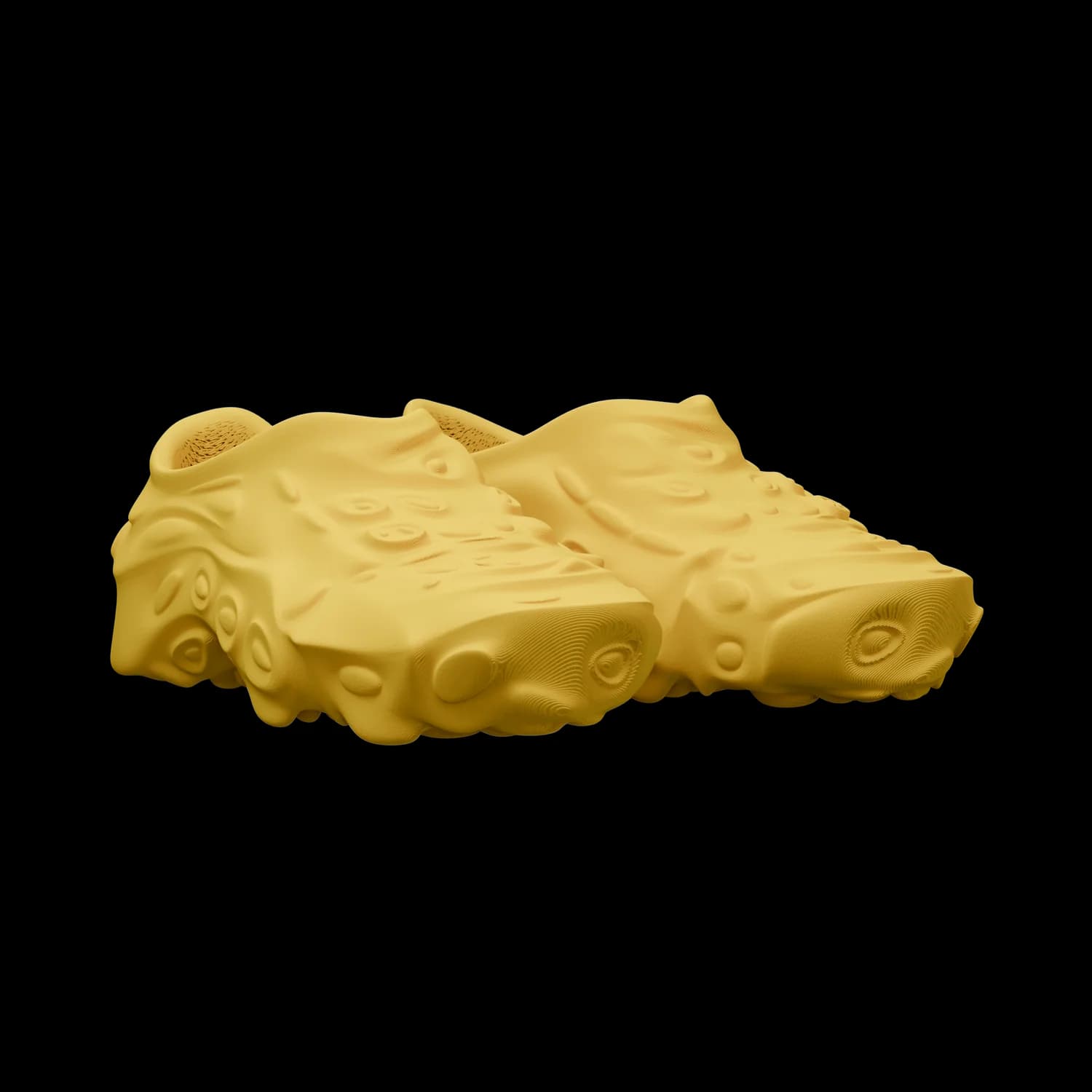 SAGRA in yellow, three-quarter angle view of a single sneaker, the grown, branching structure of the upper catching the light along its ridges
