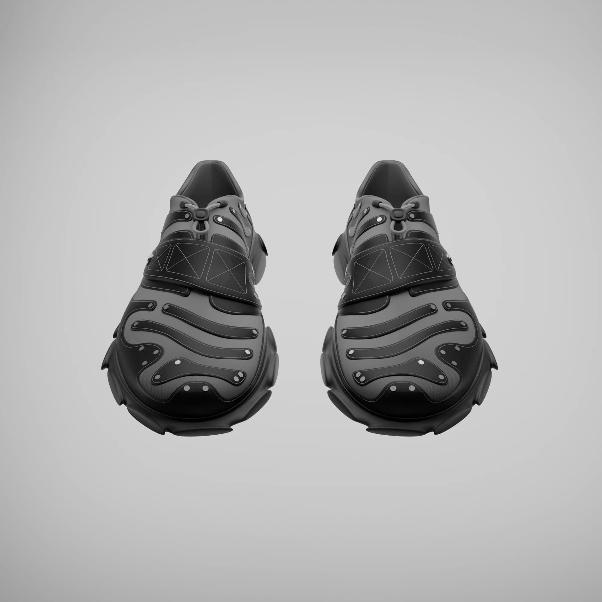 Front view of the pair, showing the wide cross-hatched instep band, the cord toggle above it, and the wave-shaped patches running down to the toe.