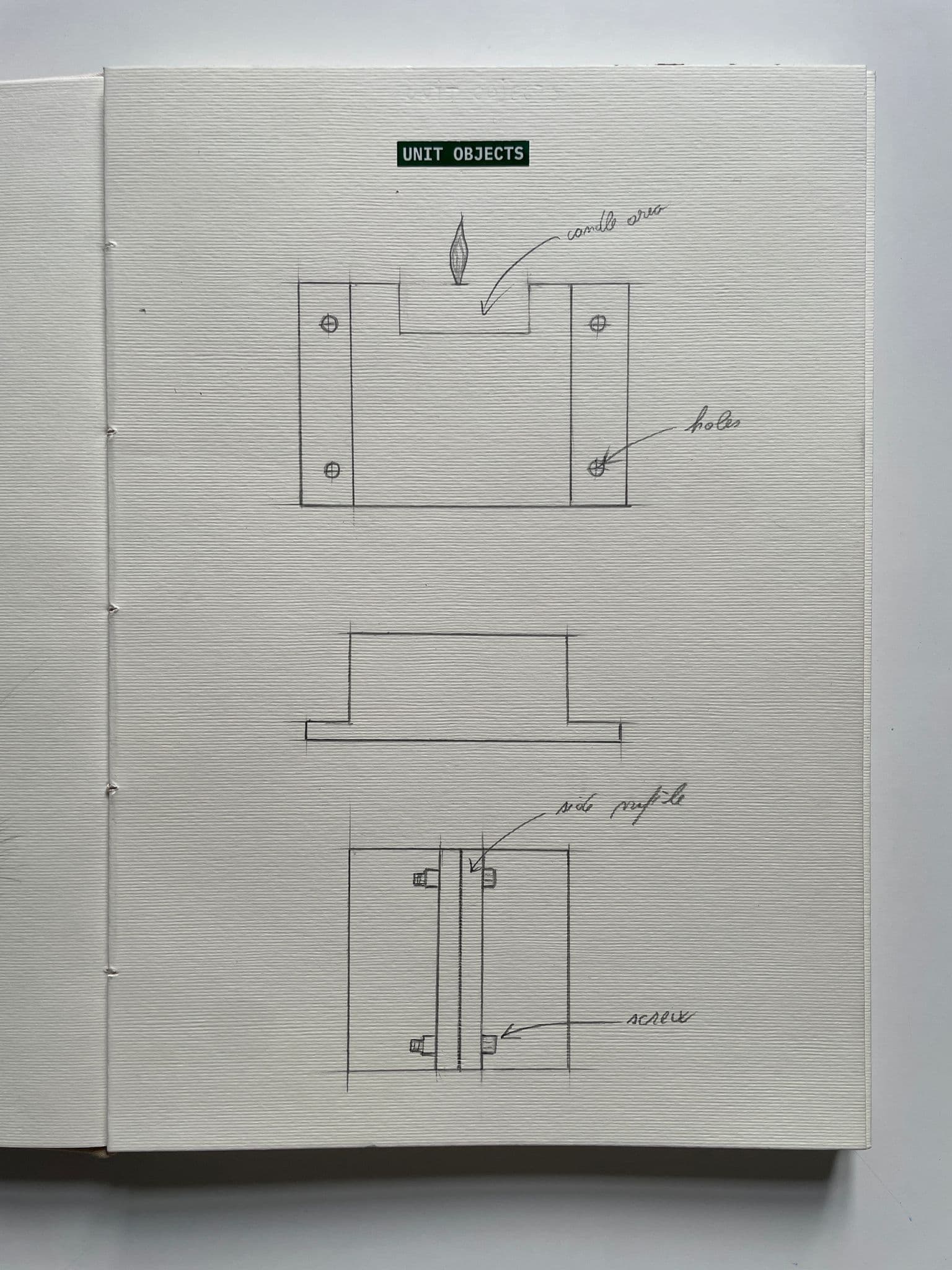 Sketchbook page with pencil drawings of the candle holder
