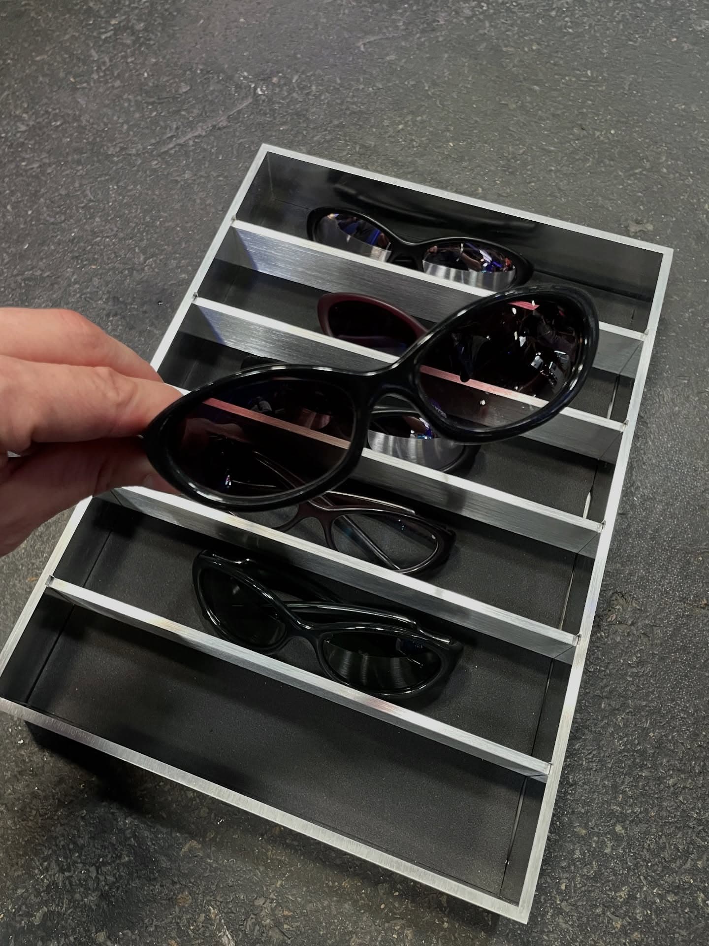 A tray of EVOS frames laid out in rows like instruments