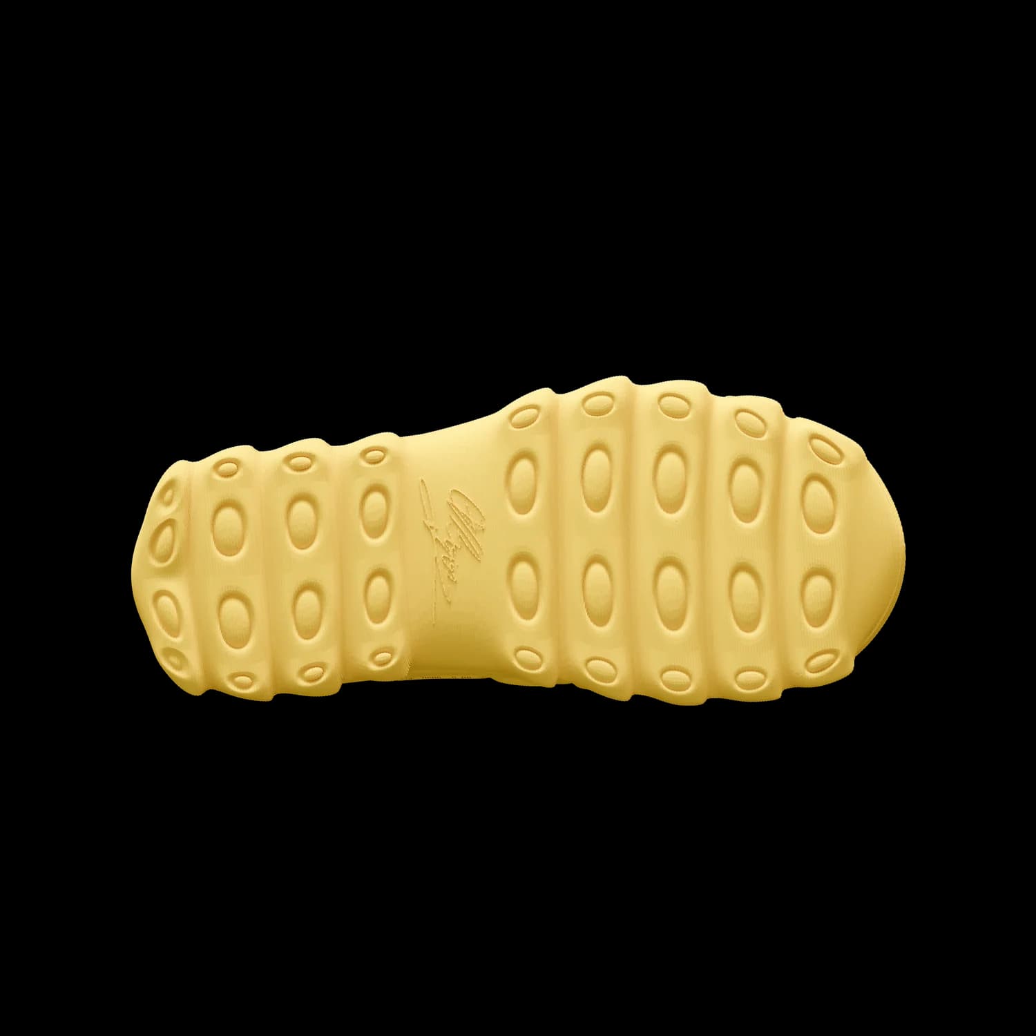 The lugged outsole of VIZE in yellow with the moulded signature